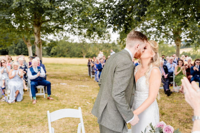 Outdoor summer ceremony at Hillfields Farm Wedding Venue