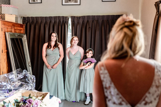 bridal preparations at outside ceremony setup at Hillfields Farm Wedding Venue